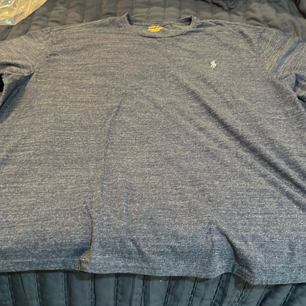 Charcoal blue polo tee.